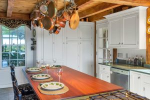 Remodeled kitchen with hanging pots