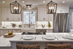 Modern white kitchen with hanging lights