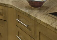 Light brown cabinets in renovated kitchen